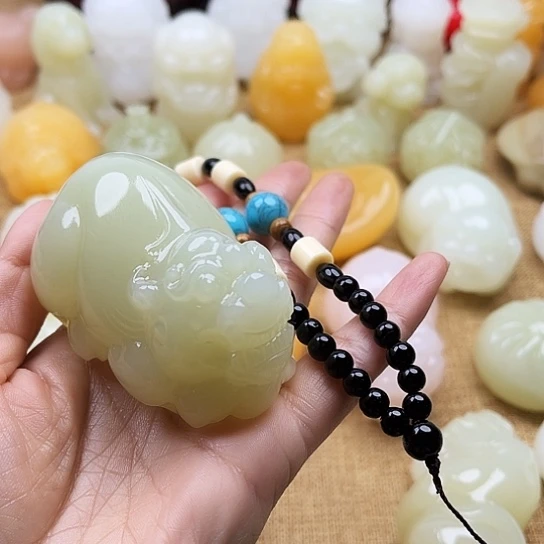 Z***峰玉天然玉石手把件