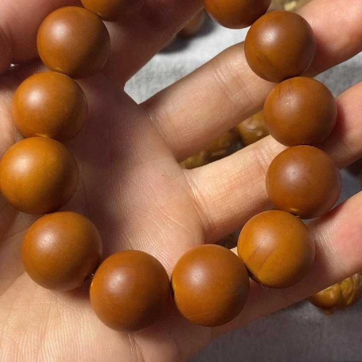 橄榄核吊坠圆珠手串