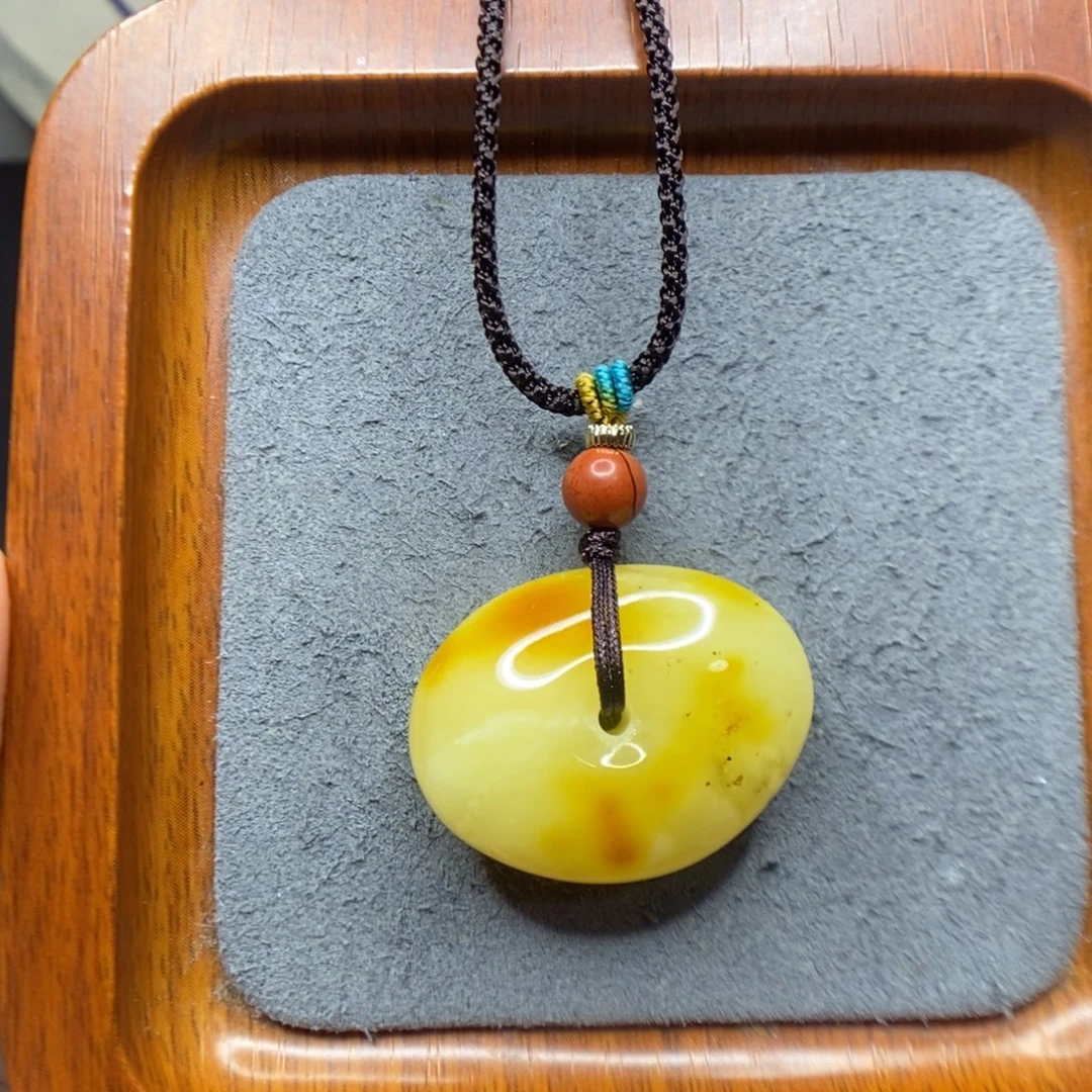 紫***壳蜜蜡未镶嵌颈饰郎