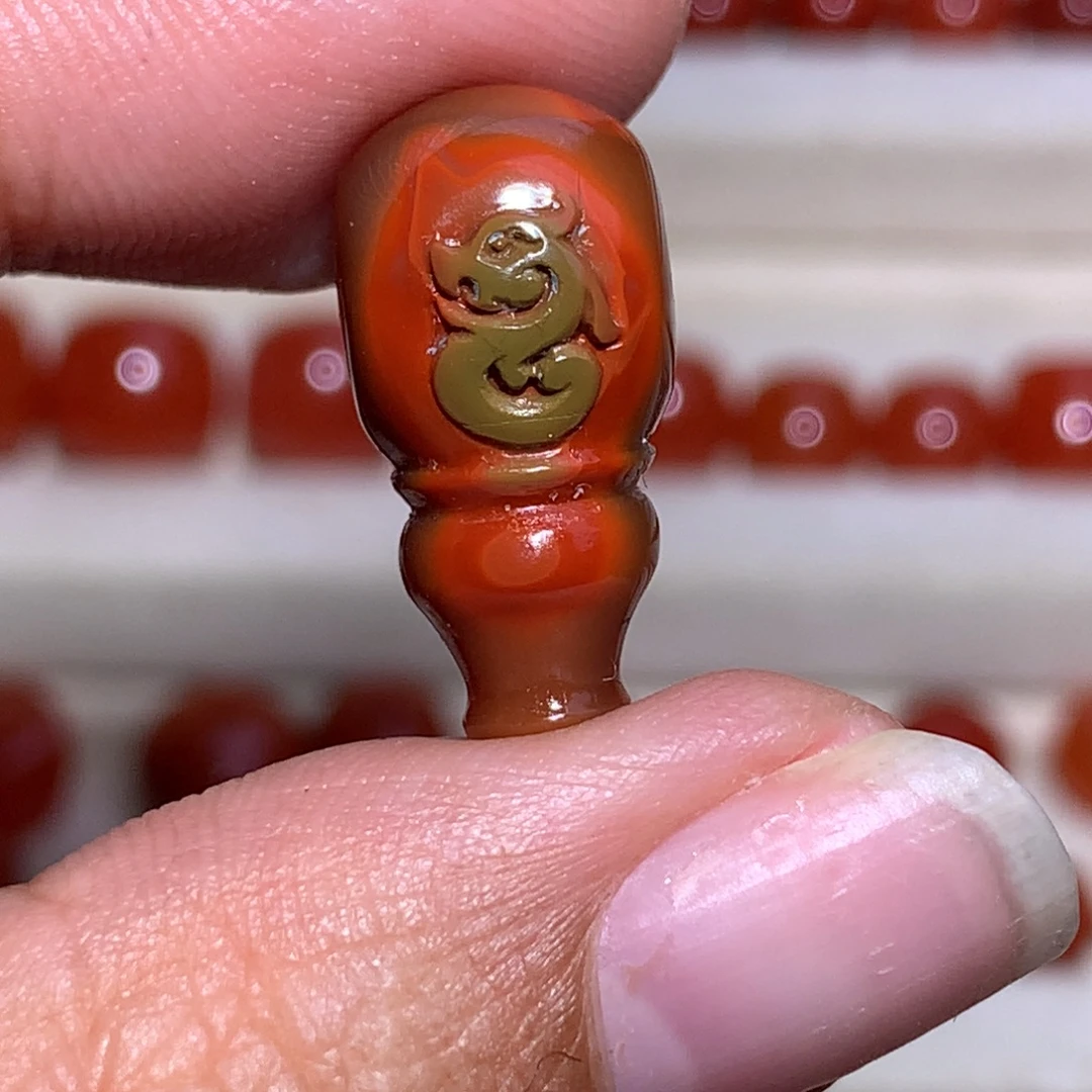 游***声南红玛瑙未镶嵌三通包浆