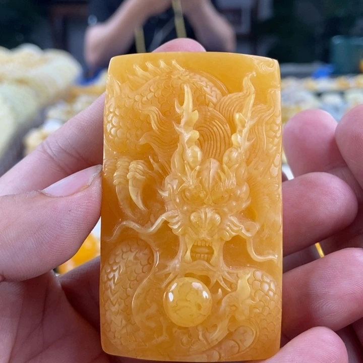 琥珀未镶嵌珠宝奇石鸡油红蜜蜡龙牌50.69