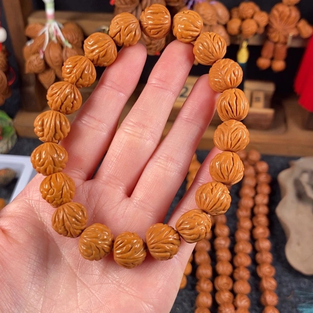 吊坠桃核桃枭手串