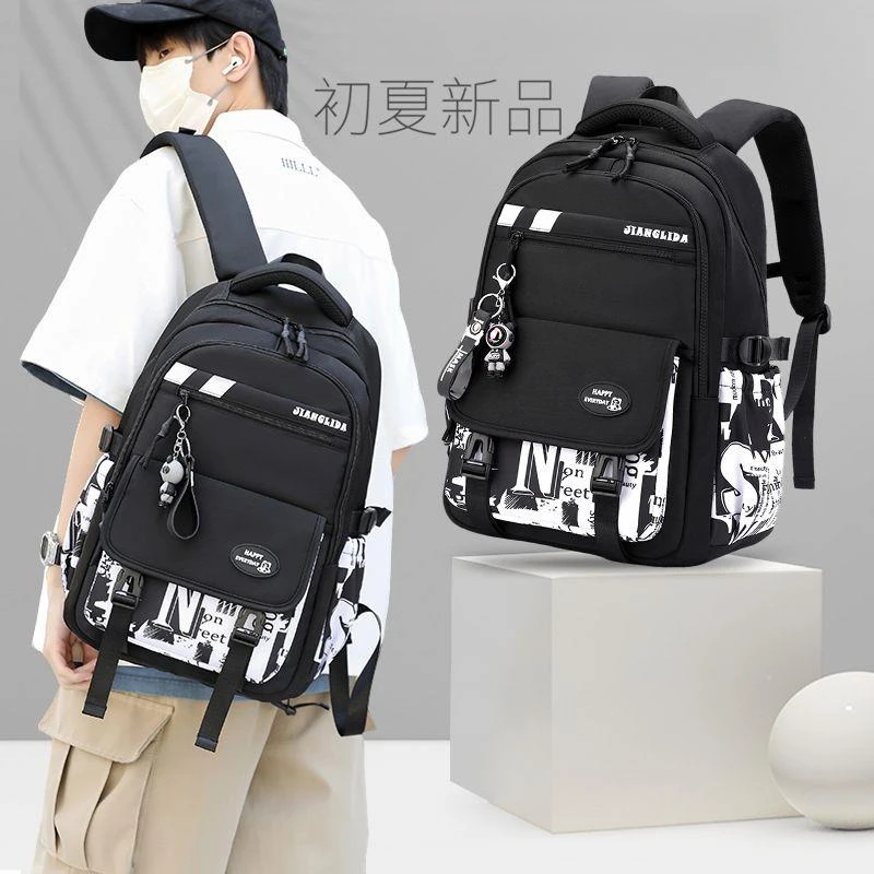 韩版初中生书包男大容量双肩包小学五六年级超轻便减负休闲背包