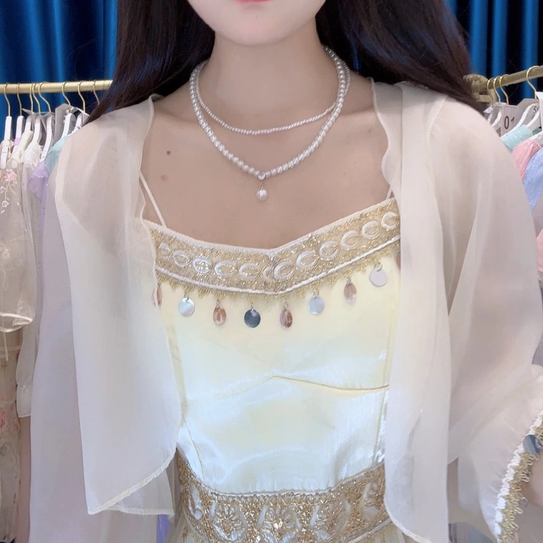 015杏色外套加裙子两件套