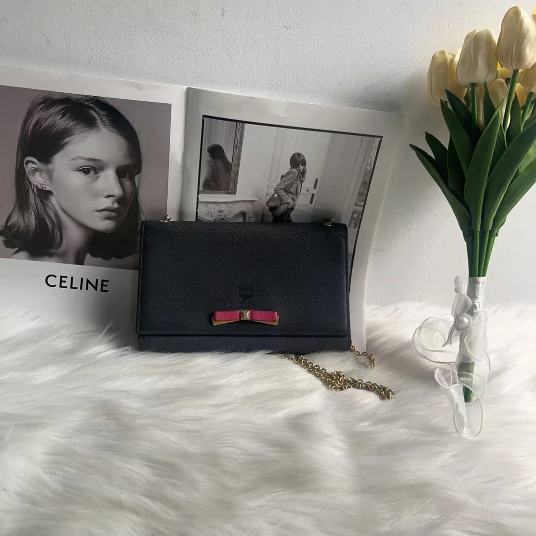 95新 MCM MCM黑色小蝴蝶结woc单肩包