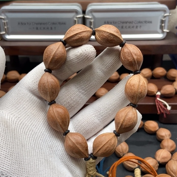 橄榄核手串1624三花