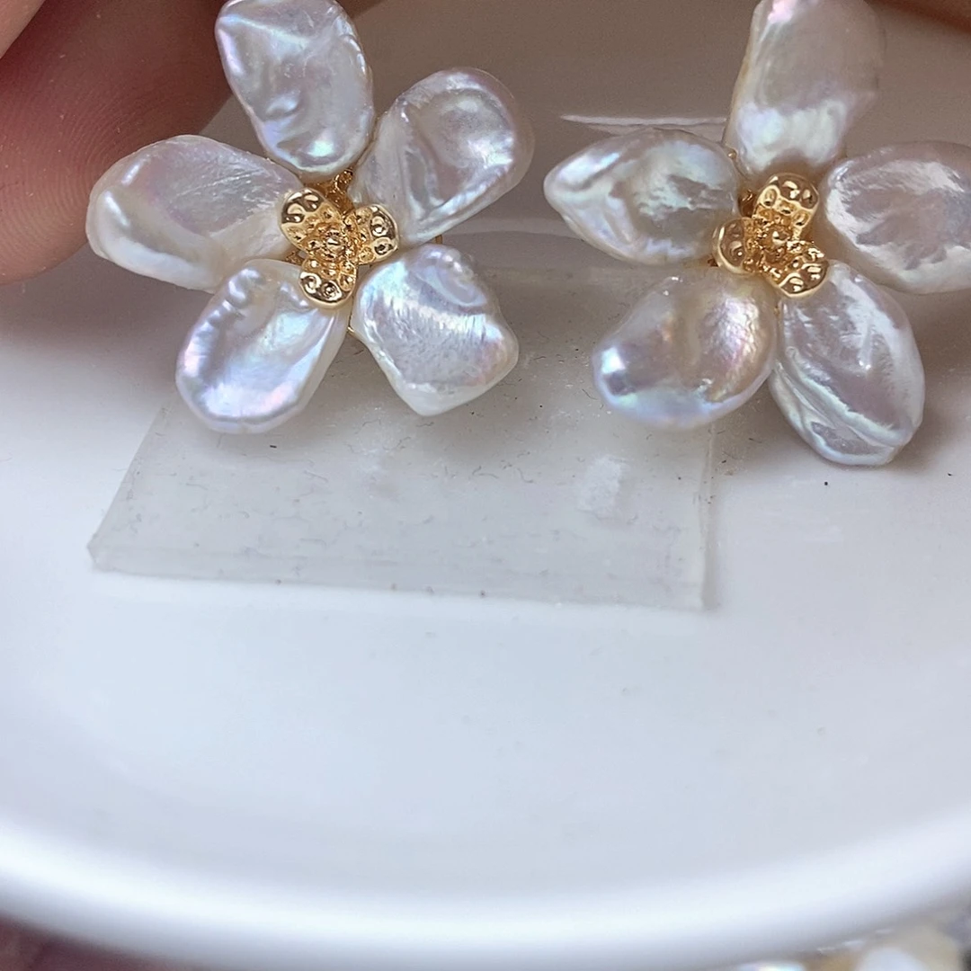 合金淡水珍珠耳钉苏****记