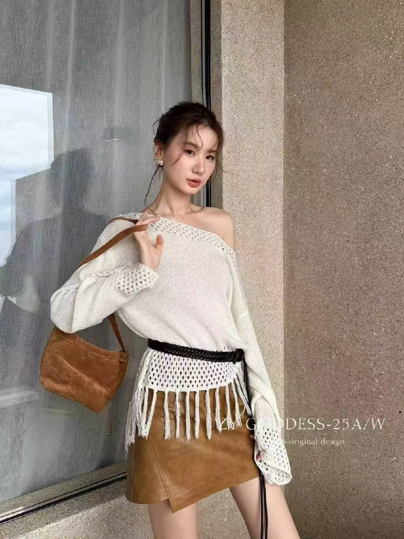 韩系设计感下摆流苏斜肩镂空针衫毛衣女早秋新款时尚宽松洋气上衣