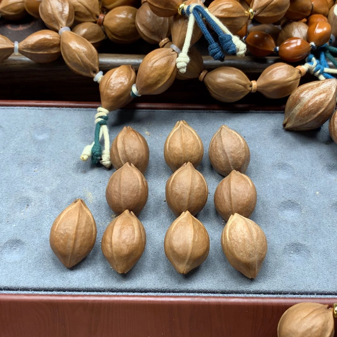 橄榄核手串/手链雍**乞1.9*2.8……