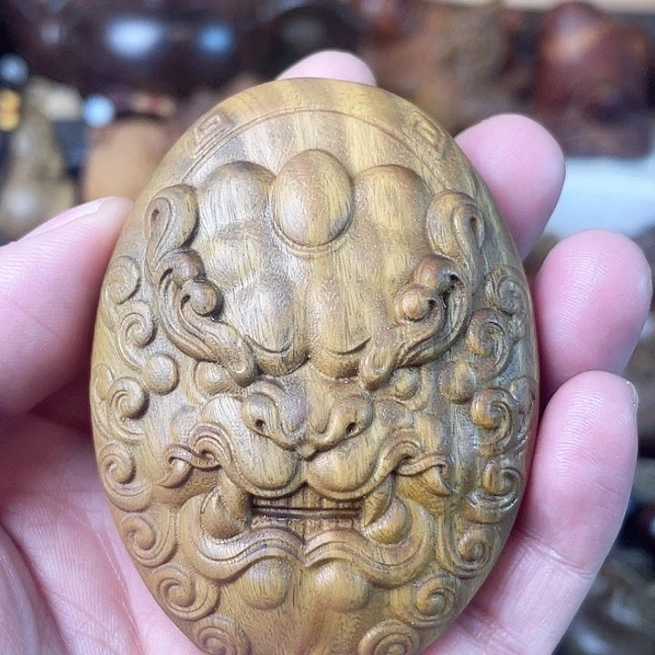 木绿檀木兽面貔貅手把件