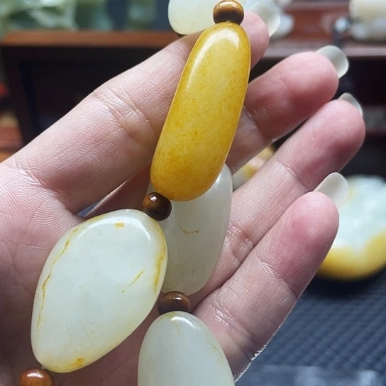 石***笑和田玉未镶嵌挂件
