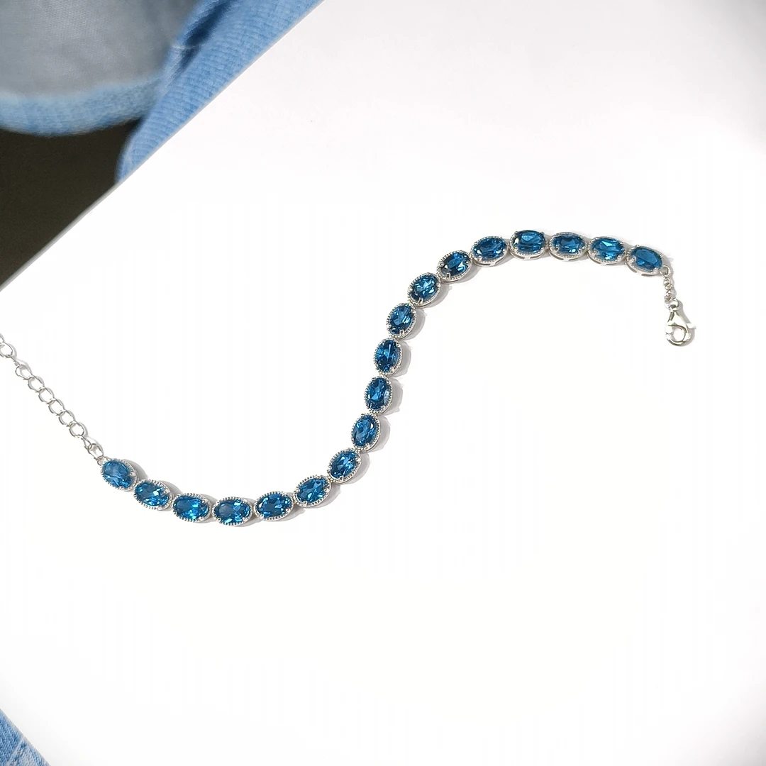 【马老师】约5*7mm精切伦敦蓝托帕石18粒手链S925银