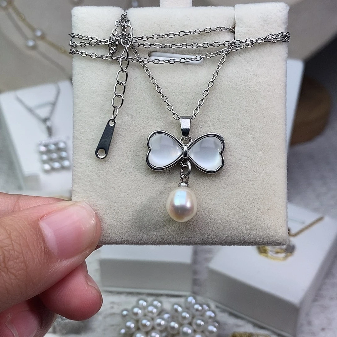 淡水珍珠银S925镶嵌耳饰