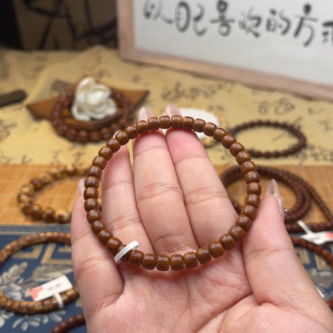 孤***呱紫金鼠手串65纯肉老型