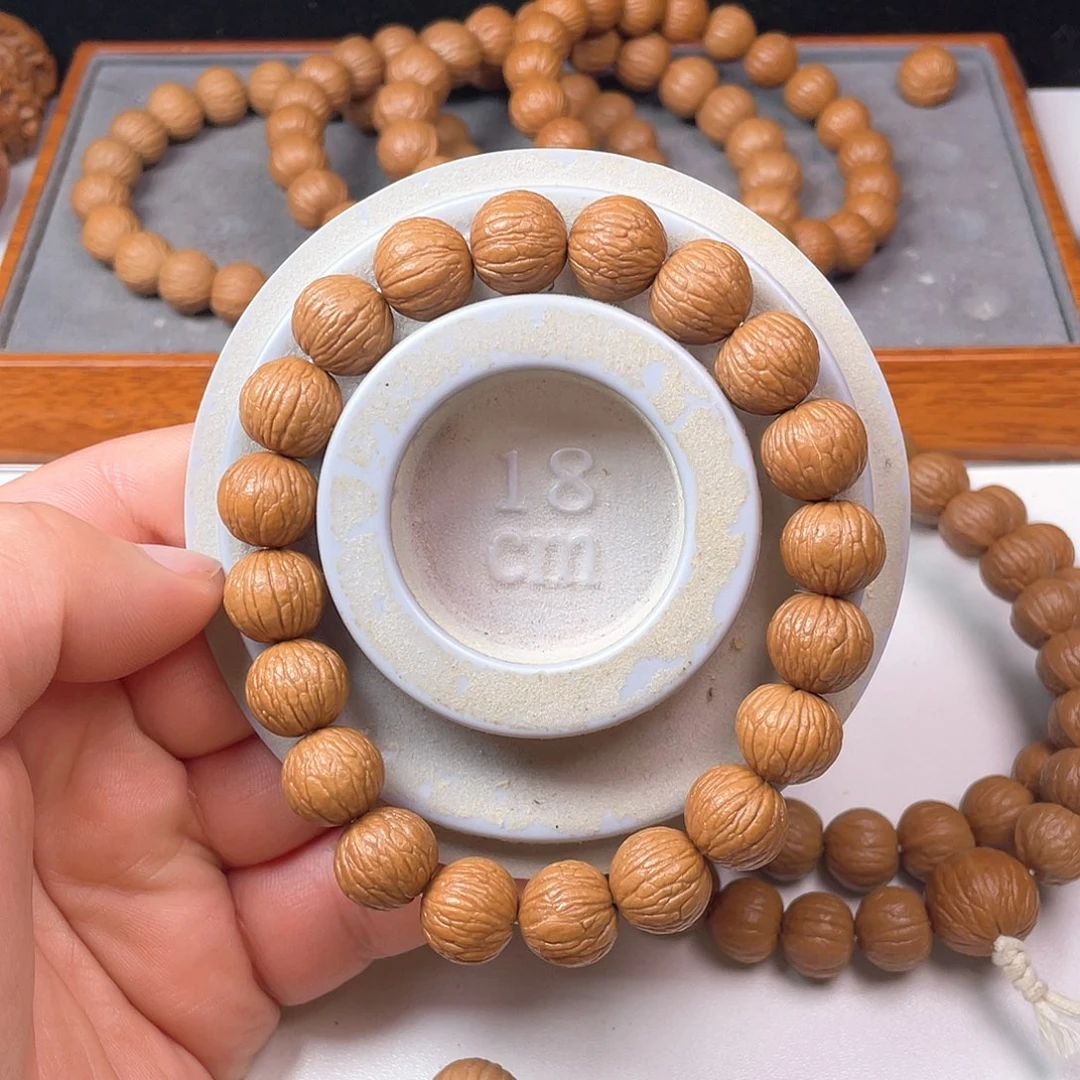 猴头核桃手串?**癫凤羽