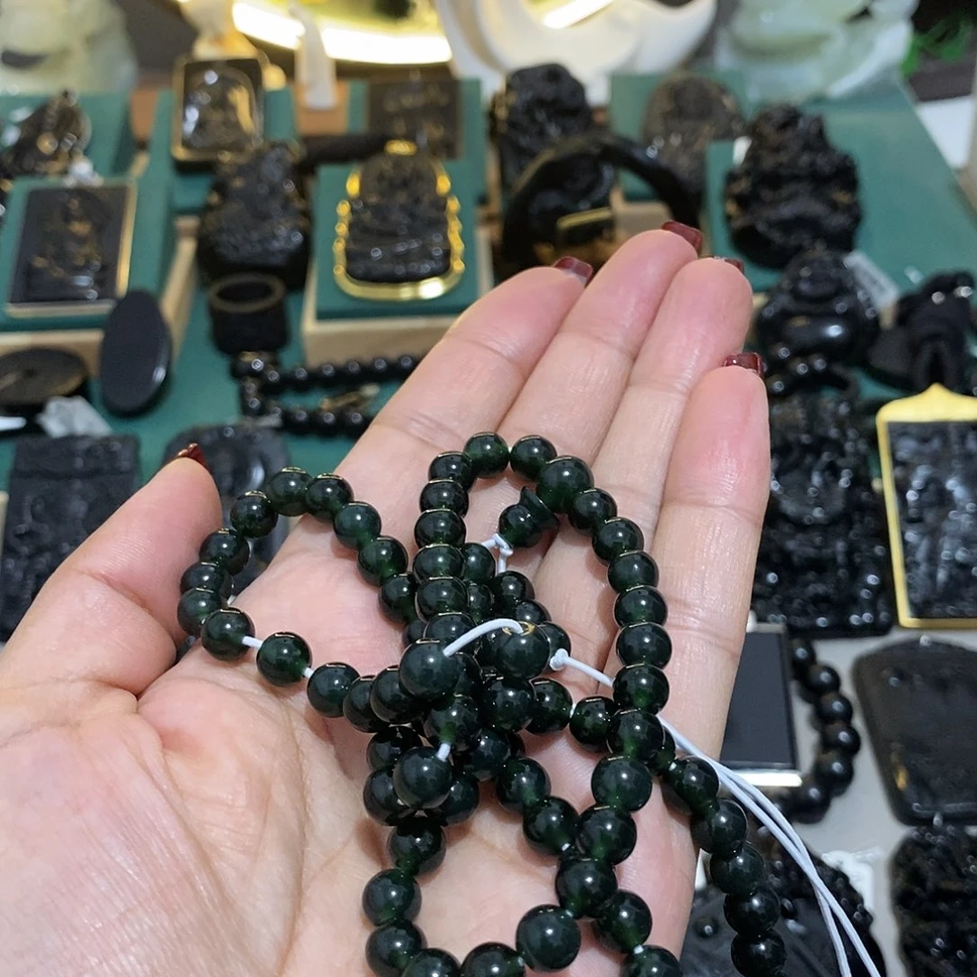 蛇纹石玉颈饰未镶嵌张*头