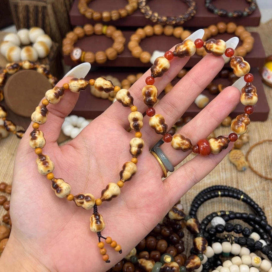 牛***-紫金鼠手串两条葫芦