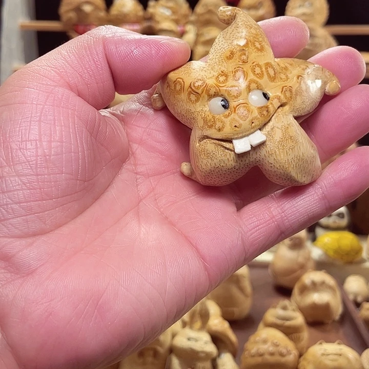竹竹根雕海星手把件