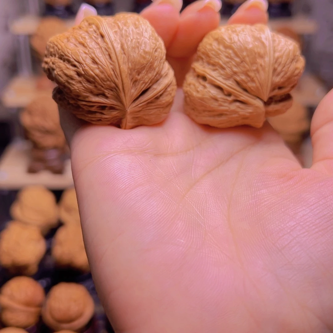 荣***记桃核吊坠连体半壁H3