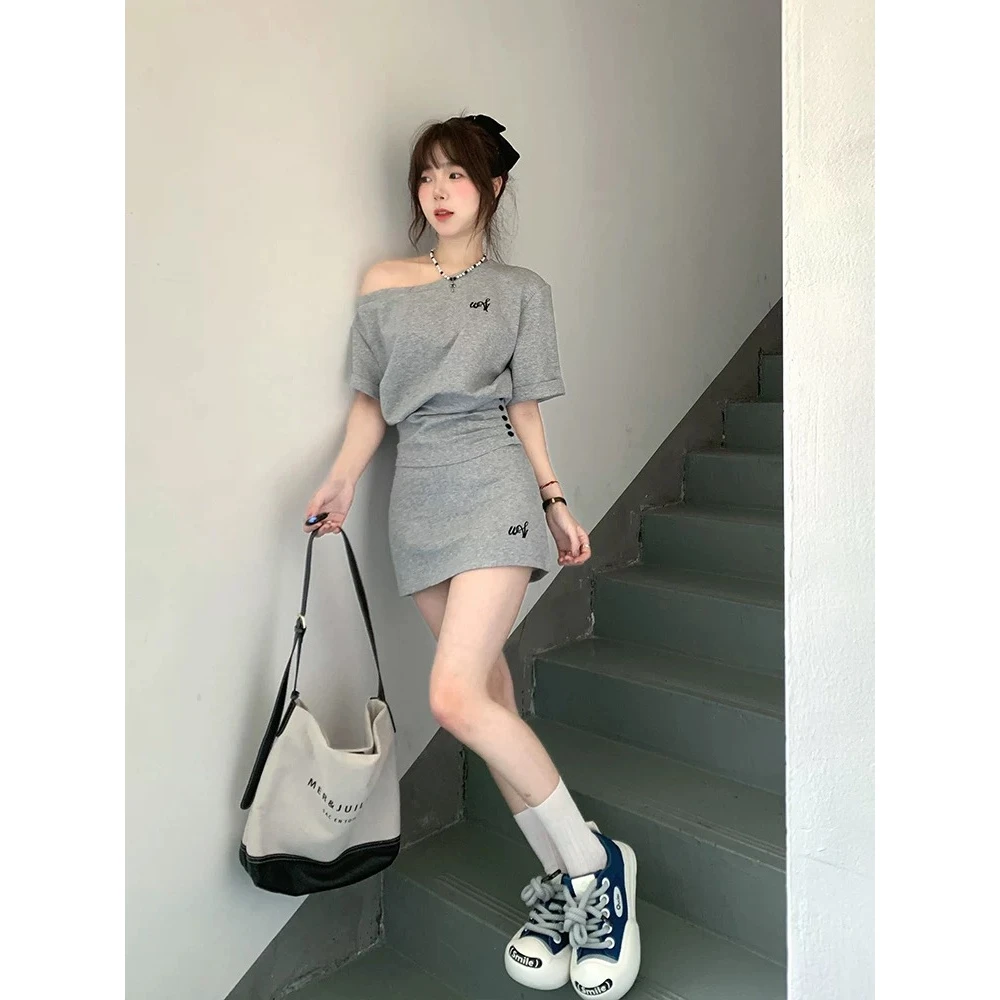 夏季新款法式设计感斜肩短袖辣妹上衣高腰显瘦刺绣气质短裙两件套