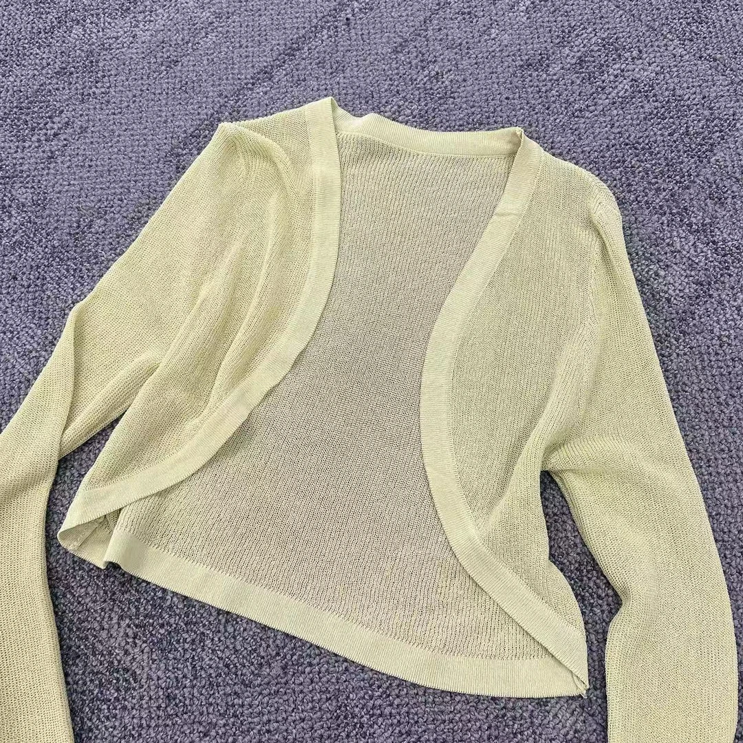 新款时尚镂空薄款披肩开衫上衣女2839