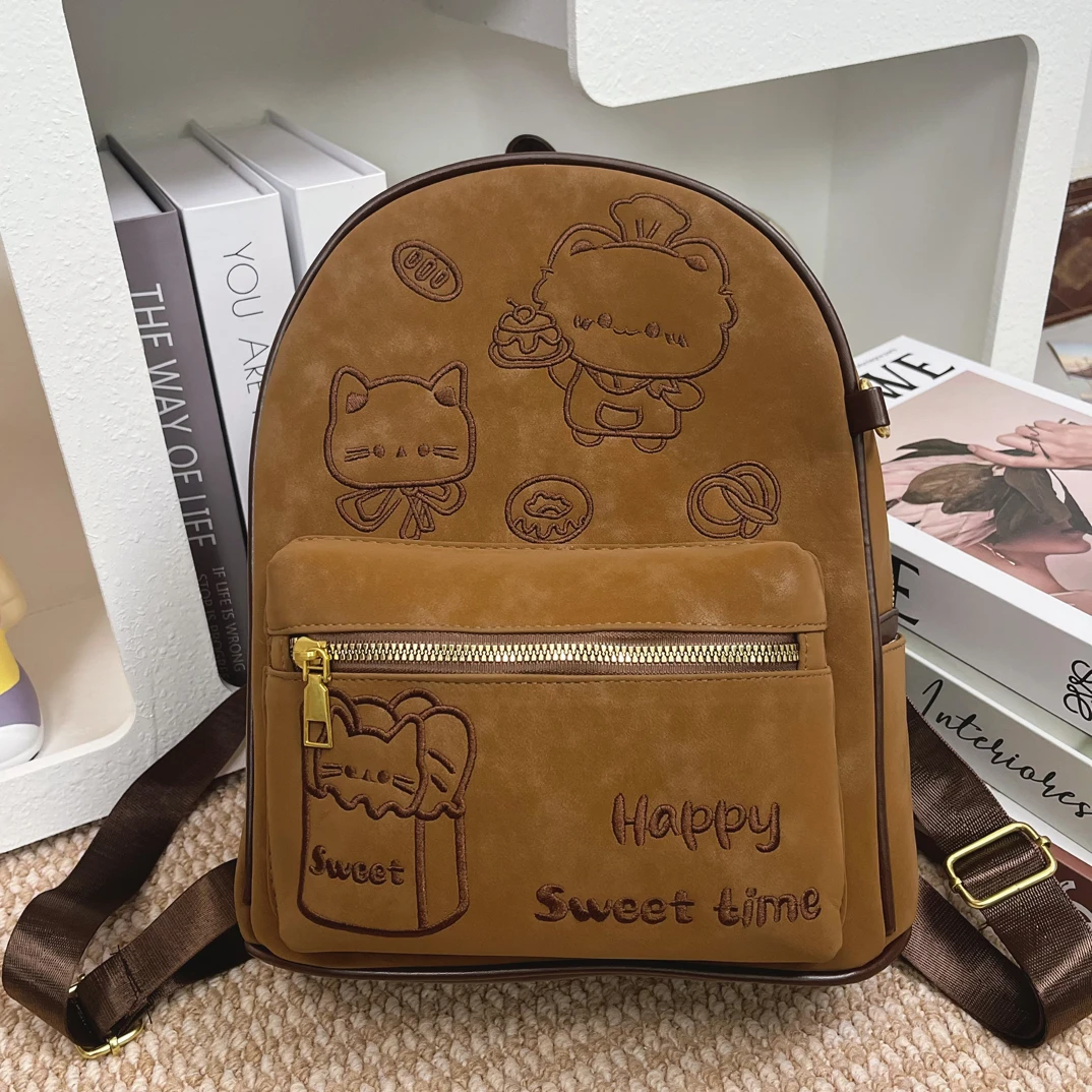 新款厨师小猫刺绣棕系休闲大容量双肩包时尚大学生上课出游背包女