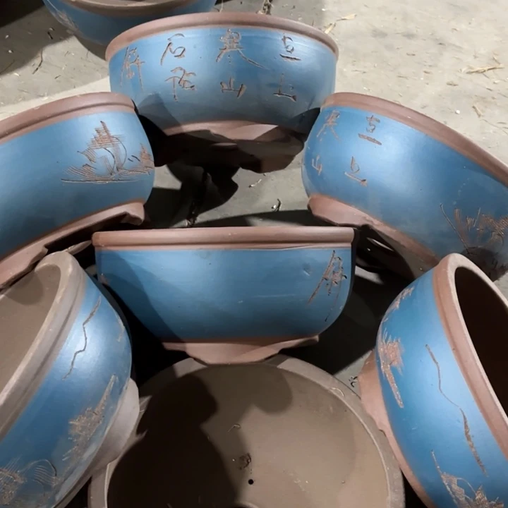 紫砂花盆100-7。   22.5-10.5