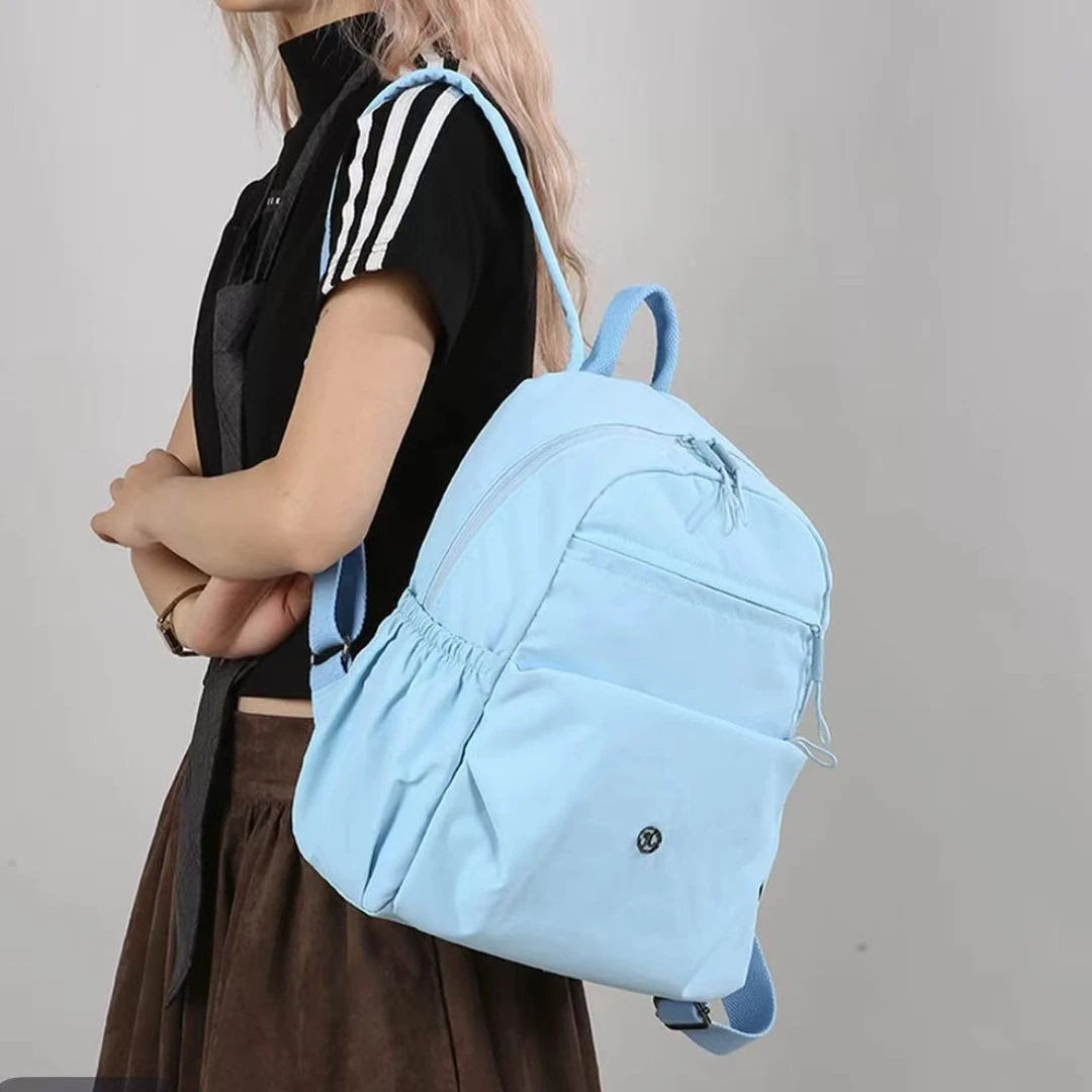 中号透气水洗运动风防震双肩包双肩背多功能时尚2025初中学生包