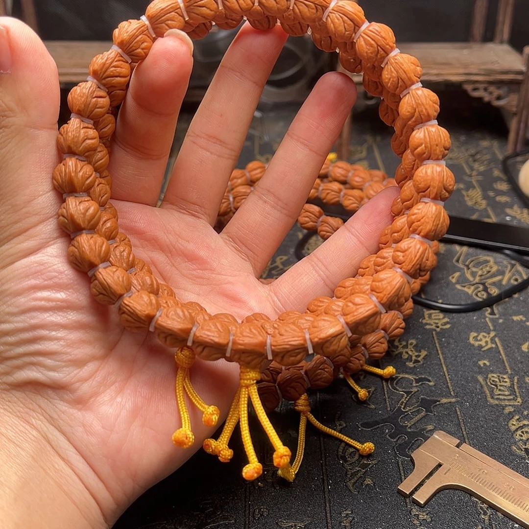 桃核吊坠玉龙手持