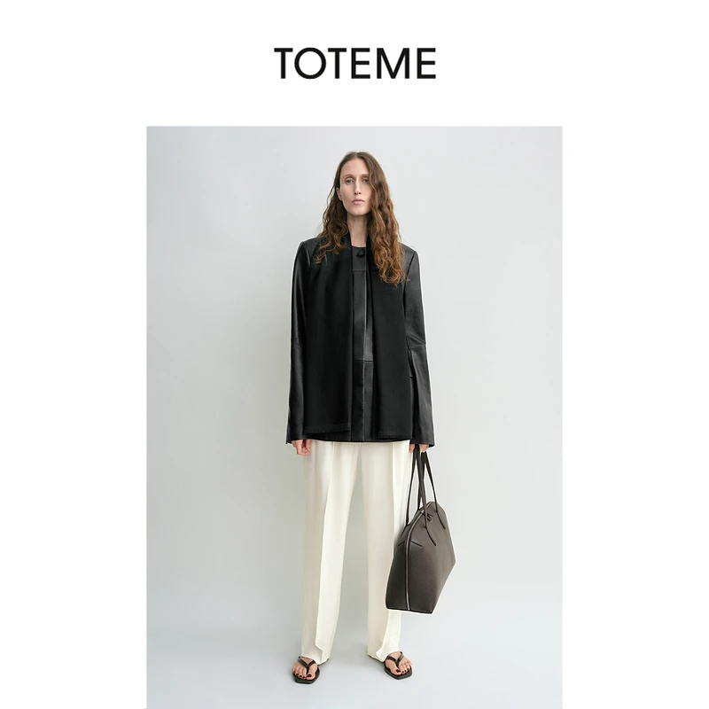 TOTEME女装黑色亮泽皮革拼接缝褶无领挺括夹克外套