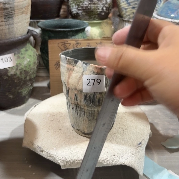 陶摆件高15，口8到11，有孔279