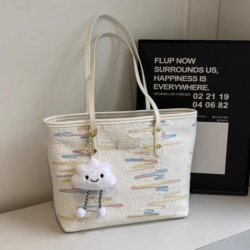 今年流行米白色大容量布包托特包绣线条纹大包2025新款上课通勤包