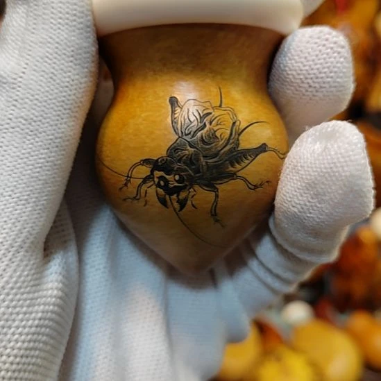 木***…葫芦随型设计手把件