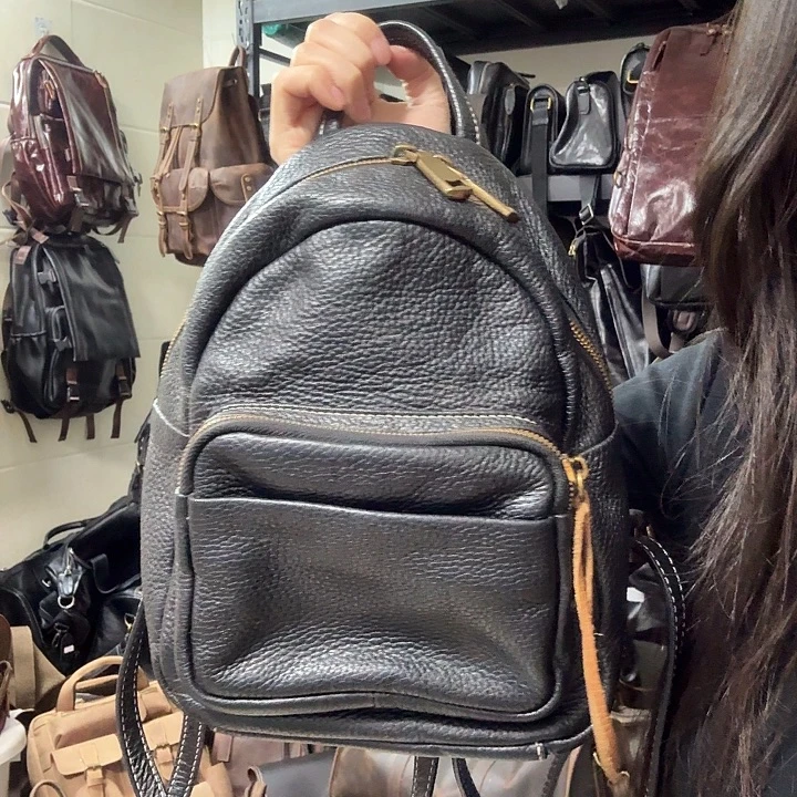 小***子头层牛皮包包背包