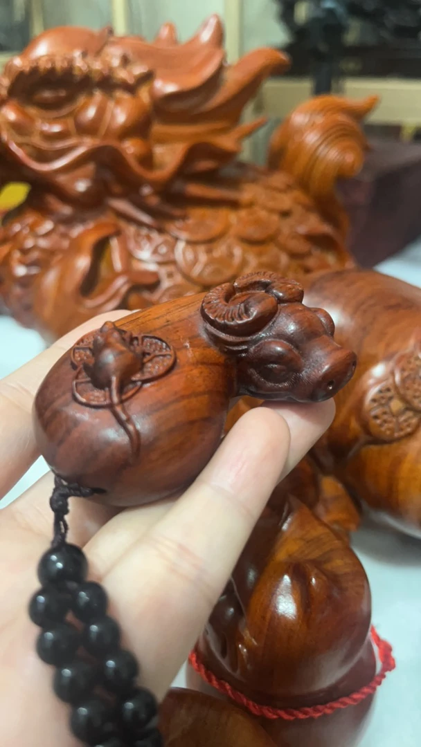 犀角紫檀木扭转乾坤手把件挂件适用于汽车后视镜装饰