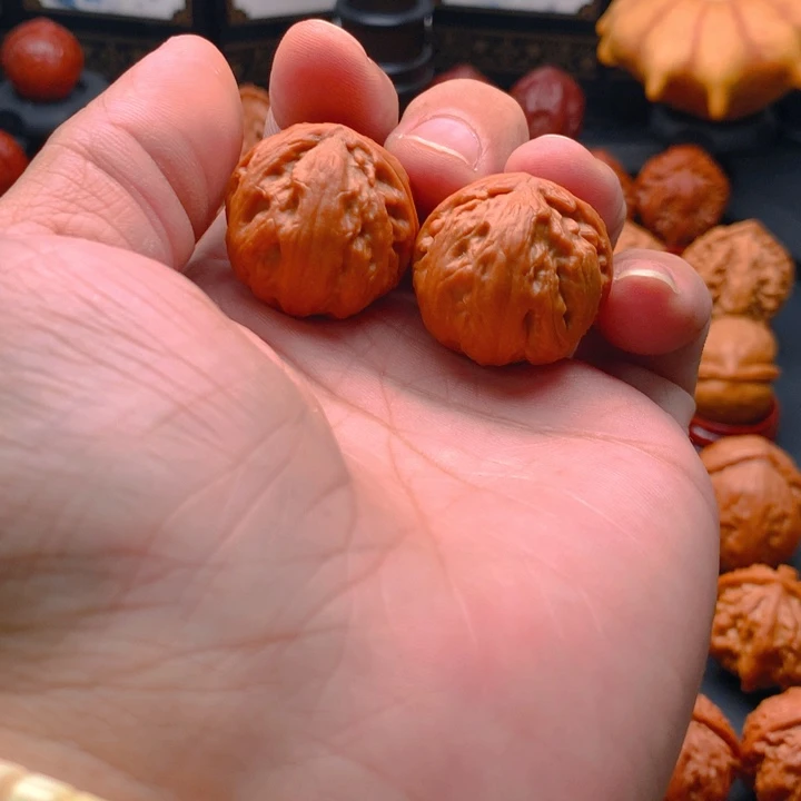 桃核把件吭***锵野生小手捻