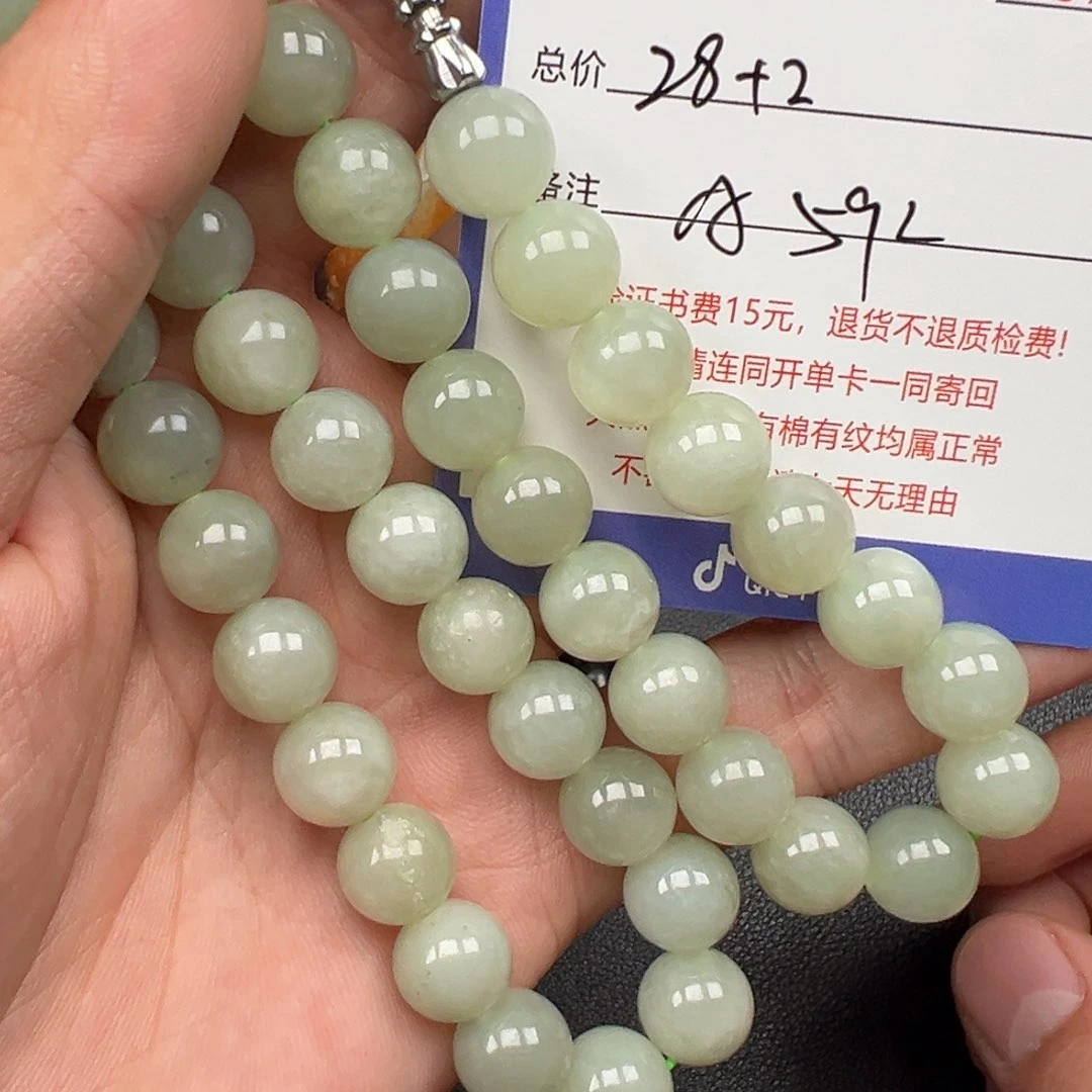 和田玉未镶嵌挂件知**黑