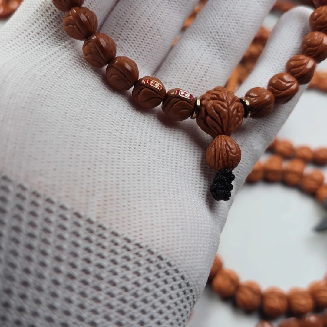 桃核手串生****茶一物一图