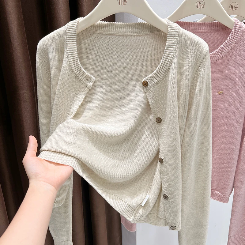 软糯杏色薄款针织毛衣外套2025秋季爆款气质圆领金属装饰高档开衫