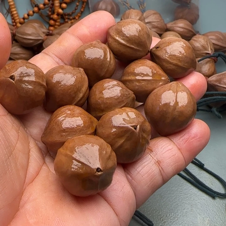 桃****手串橄榄核橄榄核原皮铁核