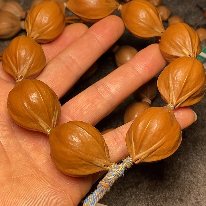 橄榄核手串2.4四花14号