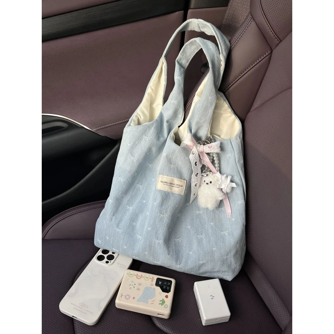 韩系牛仔蝴蝶结背心包女2025新款刺绣帆布手提包大容量单肩购物袋