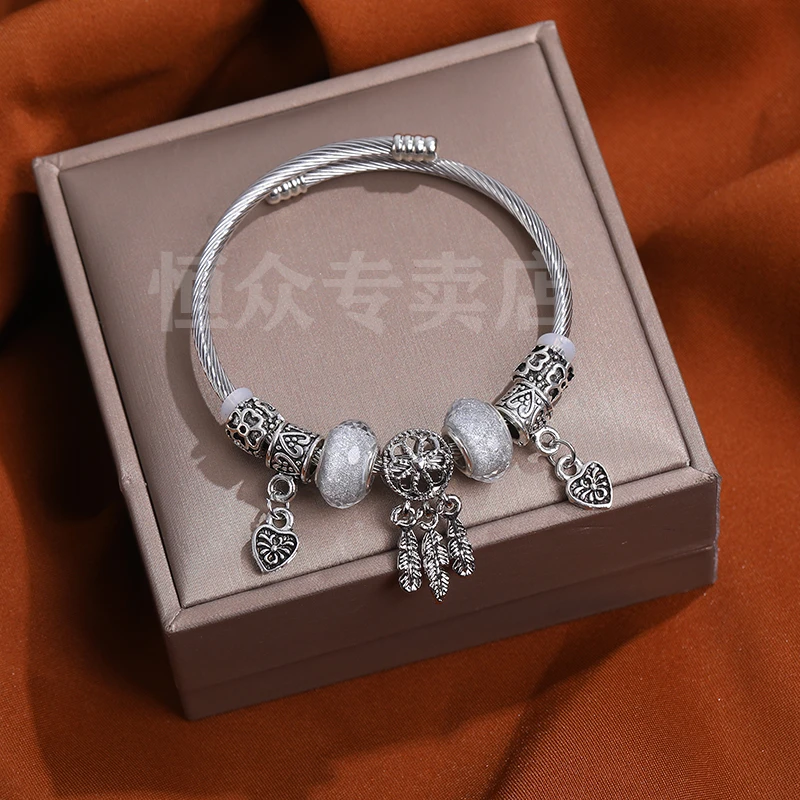 钛钢手镯 潘潘家同款捕梦网时尚手镯258流苏手链吊坠开口