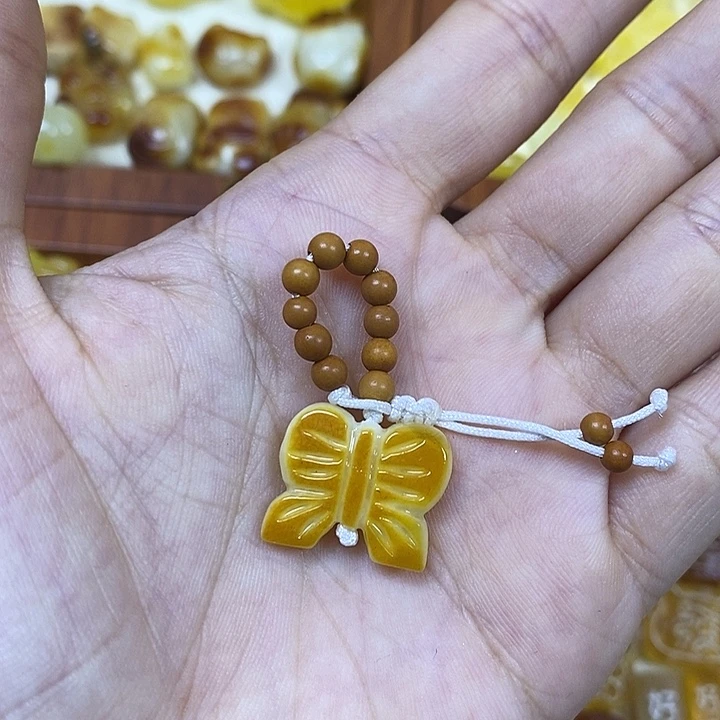 橄榄核吊坠福利蝴蝶结滴溜94