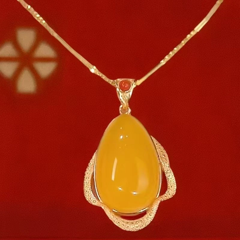 钛钢仿水晶吊坠 冰黄海洋之心水滴吊坠国潮宫廷风女款气质项链