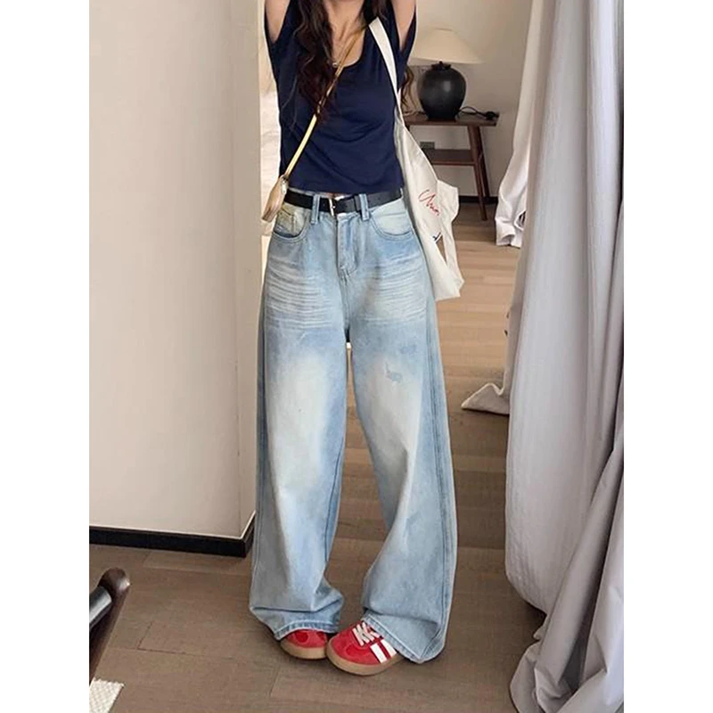 【赠运费险】浅蓝色破洞牛仔裤女秋季设计感宽松直筒高腰阔腿长裤子