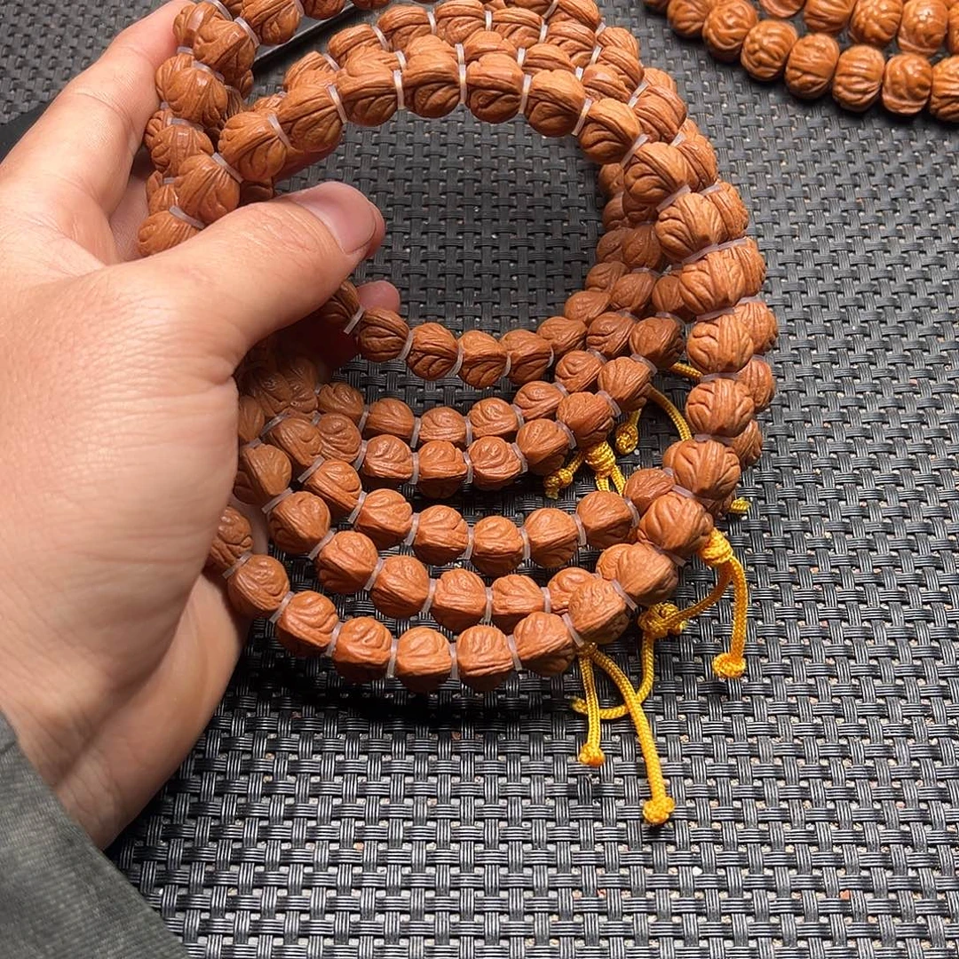 桃核吊坠小龙纹手持