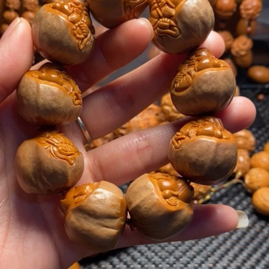 橄榄核吊坠金***锡包衣财神