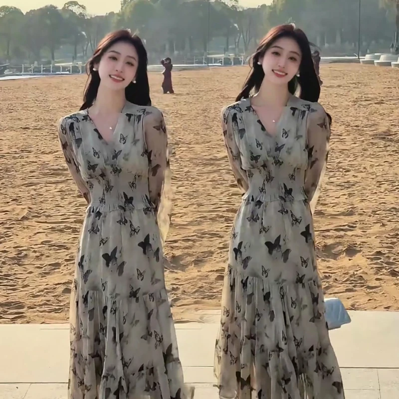 韩版温柔蝴蝶印花v领长袖连衣裙女款洋气新款春收腰显瘦a字长裙