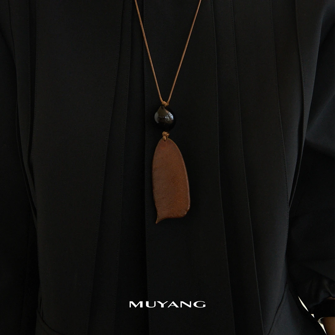 muyang/慕阳 钛钢棉绳项链 气质复古黑色时尚米果项链